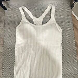 BRAND NEW ebb to street Lululemon tank (size 4)